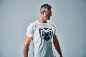Camiseta <span class="themeColor">"Tu Mente Dirige Tu Parada"</span> (Blanca)